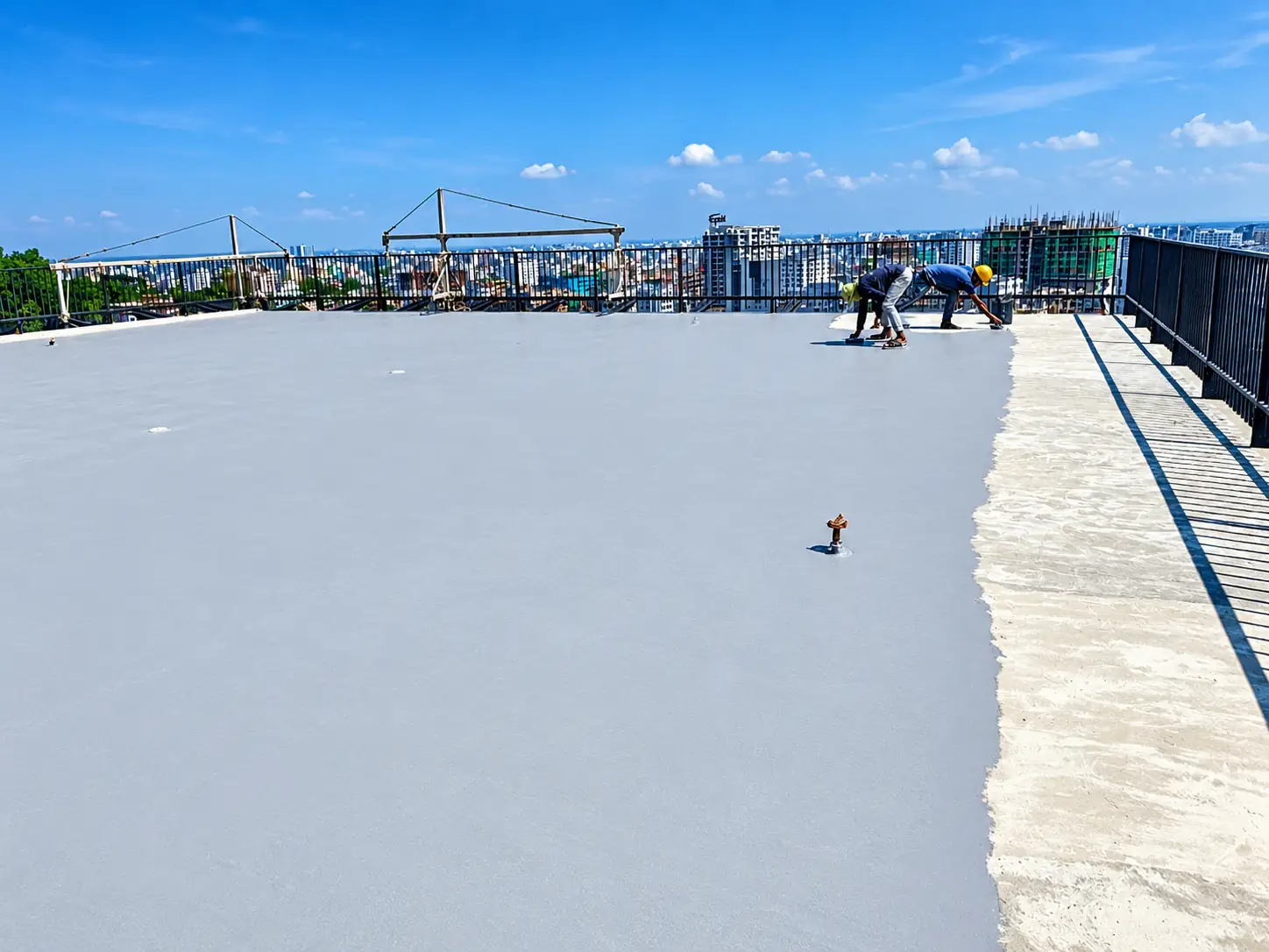 Rooftop Coating Under Blue Skies