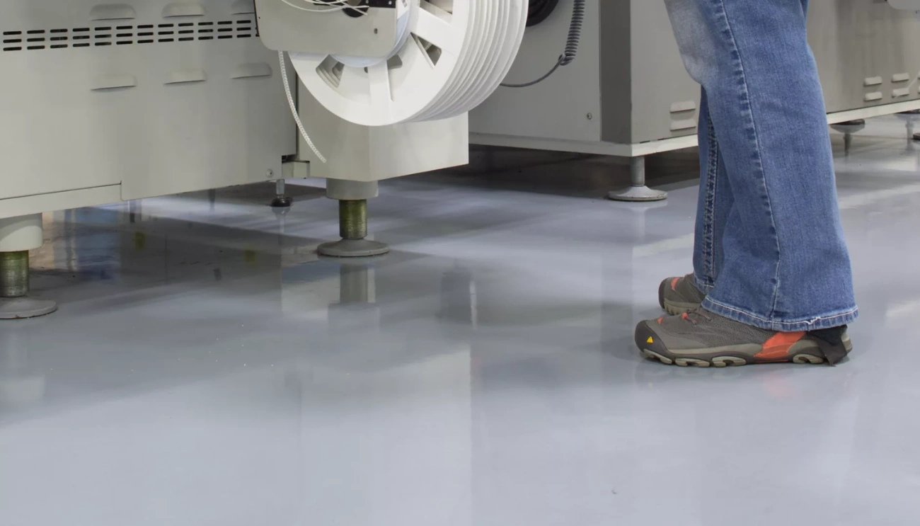 Grey ESD floor beside production machinery